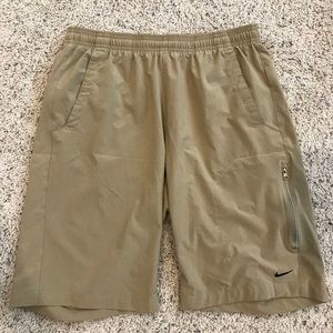 Khaki colored Nike athletic shorts